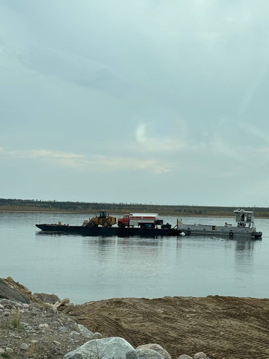 P&M Barging transporting a CAT loader and fuel truck across Lake Athabasca